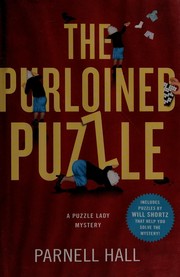 The purloined puzzle : a puzzle ldy mystery  Cover Image